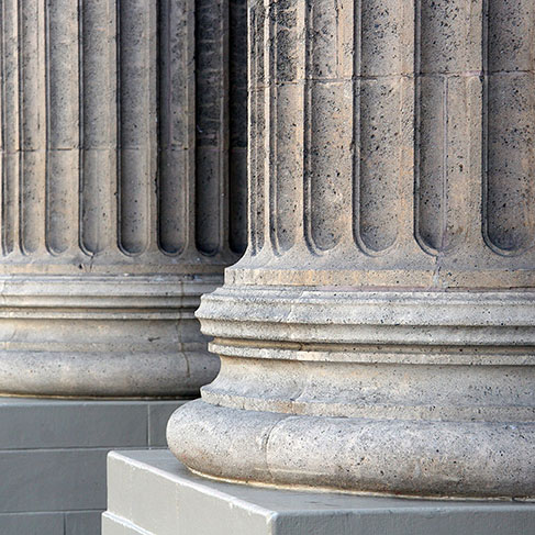 Row of the base of classic architectural stone columns
